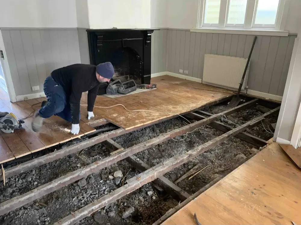 House jacked up clear for reblocking